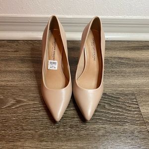 Nude (light pink tone) heels.
